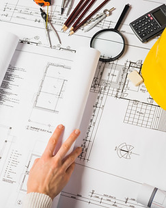 crop-architect-opening-blueprint.jpg